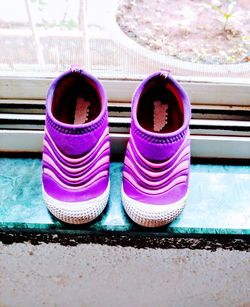 High angle view of multi colored shoes