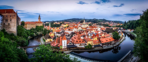 Cesky krumlov panoramic view taken right after the sunset. river vltava in czech republic.