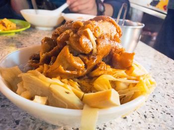 Close-up of serving food in bowl on table