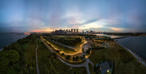 High angle view of city at sunset