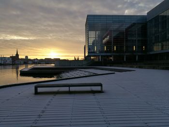 View of bridge in city during sunset