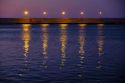 Scenic view of sea against sky at night