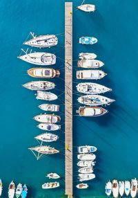 High angle view of boats moored at harbor