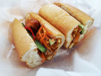 High angle view of fresh banh mi in tissue