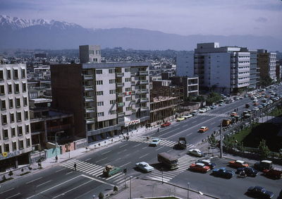 High angle view of street amidst buildings in city