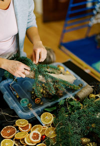 Midsection of man preparing food