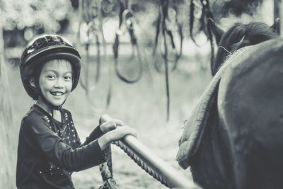 Portrait of smiling boy outdoors