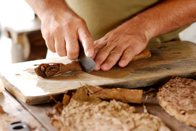 Making cuban cigars by hand in vinales, cuba.