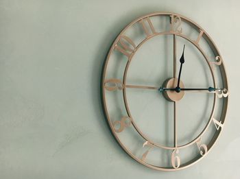 Close-up of clock on wall