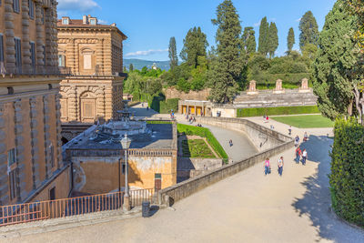 People in front of historical building