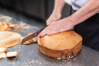 Close-up of person preparing food