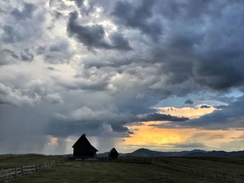 Scenic view of landscape against sky during sunset