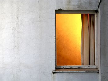 Wall and window with orange light