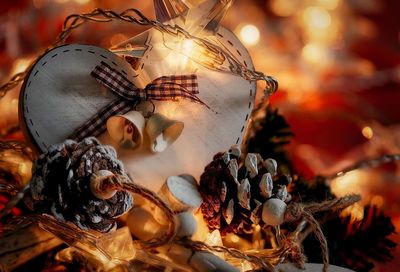 Close-up of christmas decorations at night