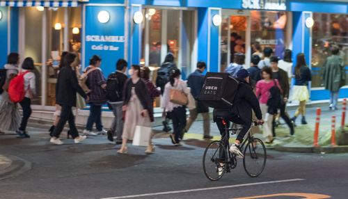 People on street in city