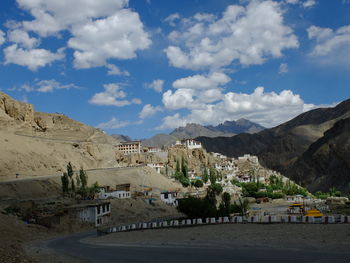 View of buildings against cloudy sky