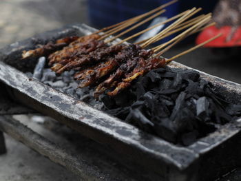 Close-up of meat on barbecue grill