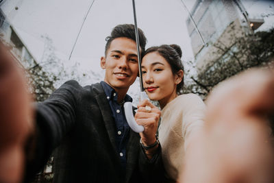 Portrait of smiling young couple