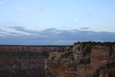 Low angle view of rock formation against sky