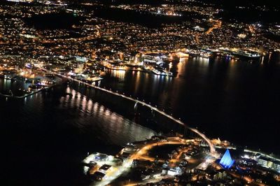 High angle view of illuminated city at night
