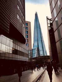 Low angle view of modern buildings against sky