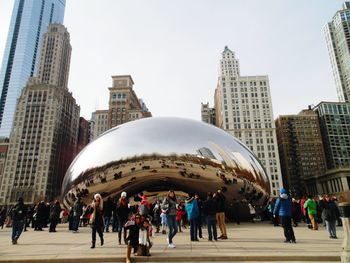 Tourists in front of building