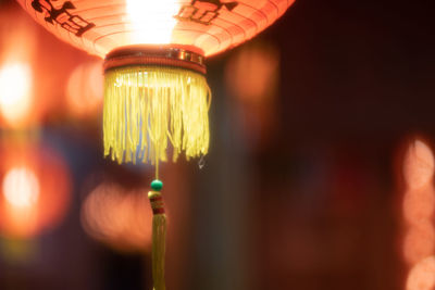 Close-up of illuminated light bulb