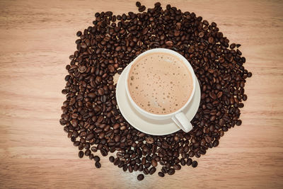 High angle view of coffee cup on table