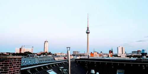 View of buildings in city against sky