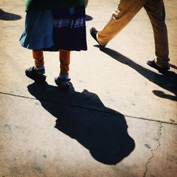 Low section of person standing on ground