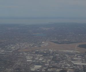 Aerial view of cityscape against sky