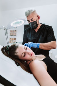 Portrait of a smiling man with woman