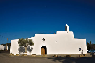 White building against clear blue sky