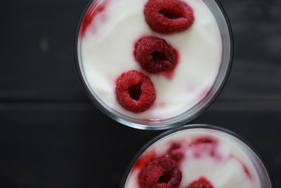 High angle view of strawberries in glass on table