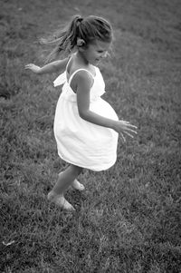 High angle view of happy girl on field