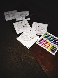 High angle view of books on shelf