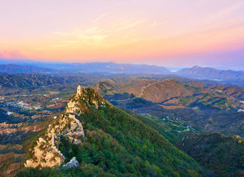 Scenic view of landscape against sky during sunset