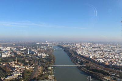 High angle view of river amidst buildings in city