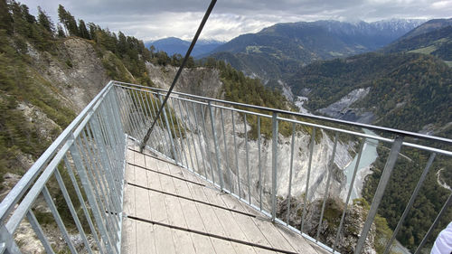 Scenic view of dam and mountains