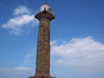 Low angle view of tower against sky