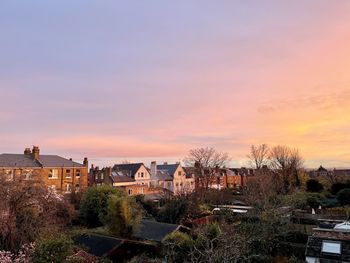 High angle view of townscape against sky at sunset