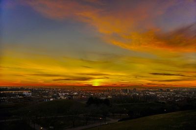 High angle view of townscape against sky during sunset