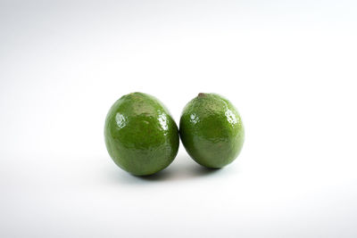 Close-up of fruits against white background