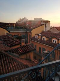 High angle view of buildings in city against sky