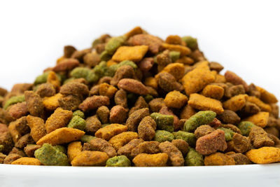 Close-up of candies against white background