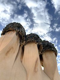 Low angle view of statue against sky