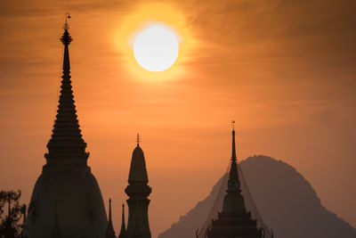 Low angle view of temple against sky during sunset