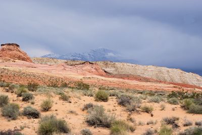 Rock formations in desert against sky