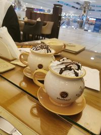 High angle view of coffee cup on table