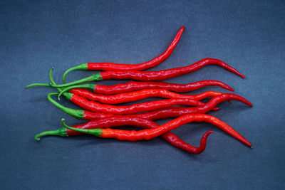 High angle view of red chili peppers on table
